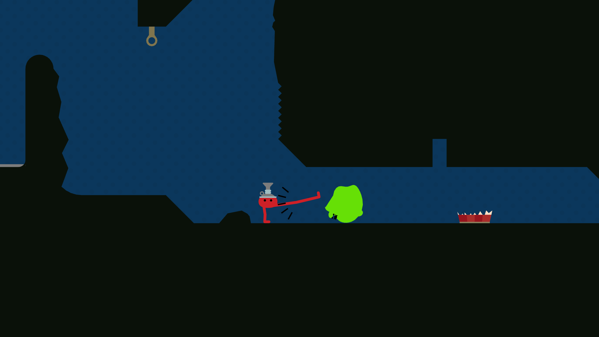 Pikuniku - A red character with a weird hat kicks a green blob around